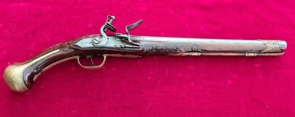 A high quality European flintlock pistol with 12 inch barrel. Circa 1810.  Ref 3175.